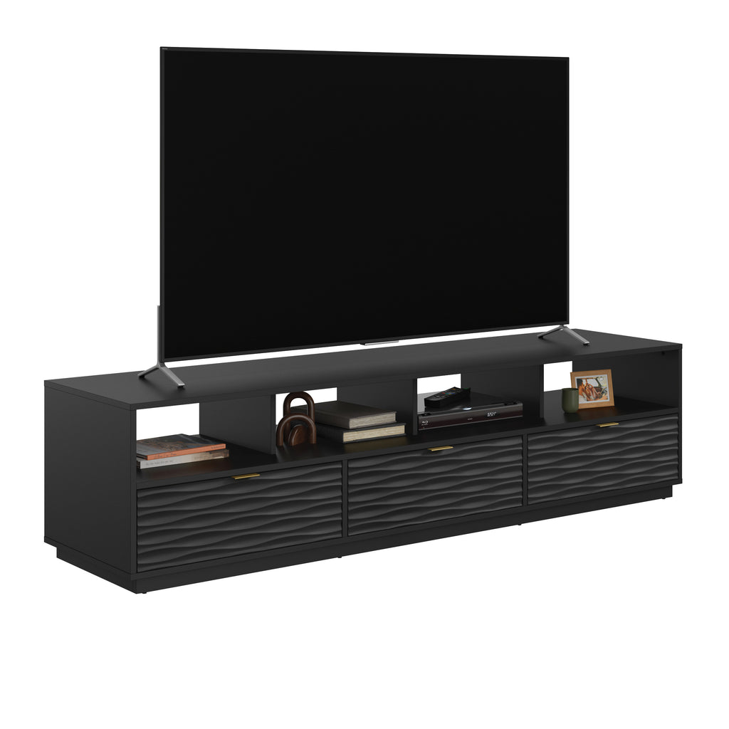 Black credenza supporting an 80 inch TV, with open shelves holding books and decor, ideal for modern living rooms.
