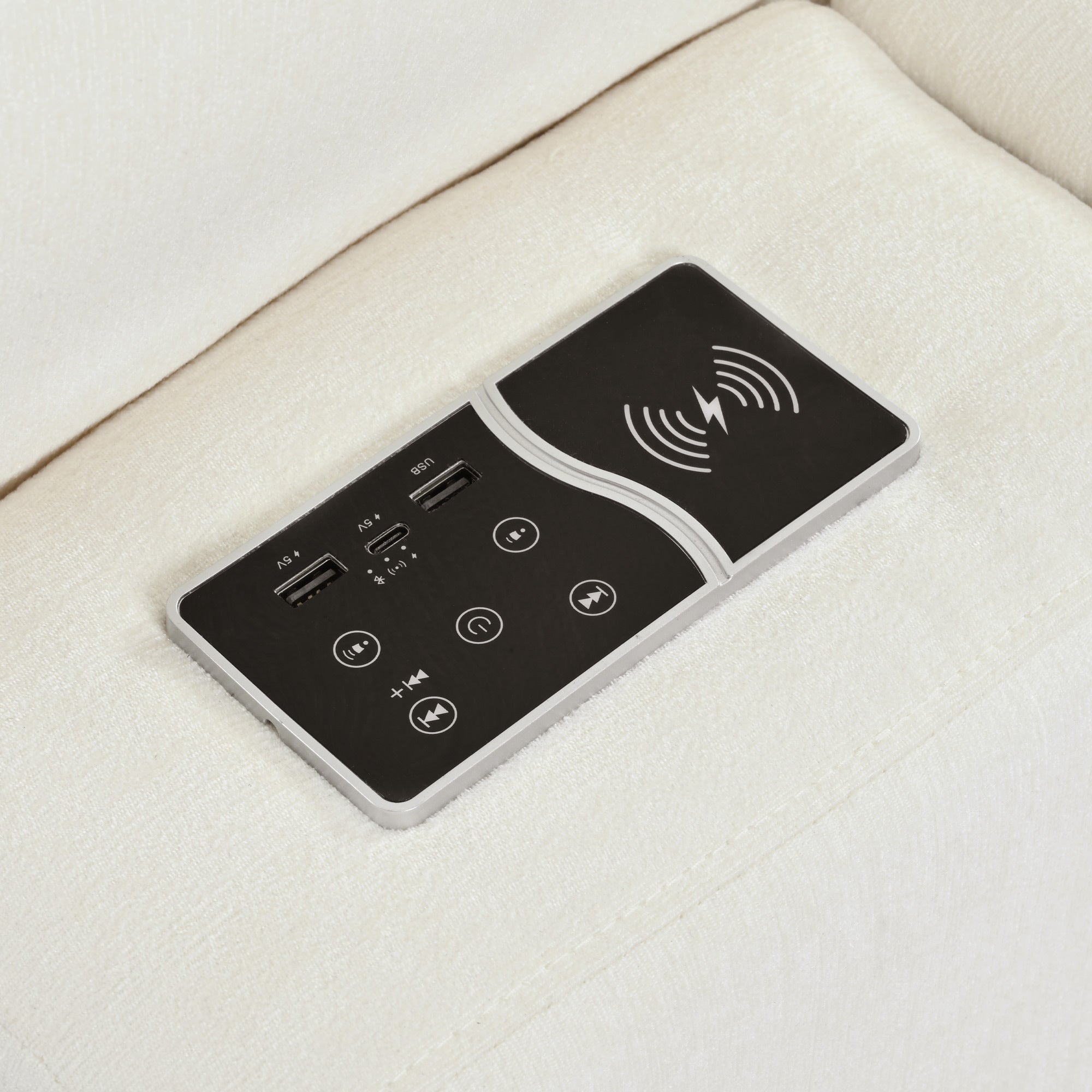 Detail of smart control panel on Modular Sofa with USB ports, wireless charging, and media controls for convenience.