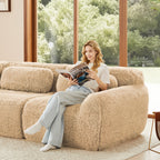 Woman reading on light khaki modular 3-seater sofa, highlighting comfort, plush texture, and modern no-assembly convenience.