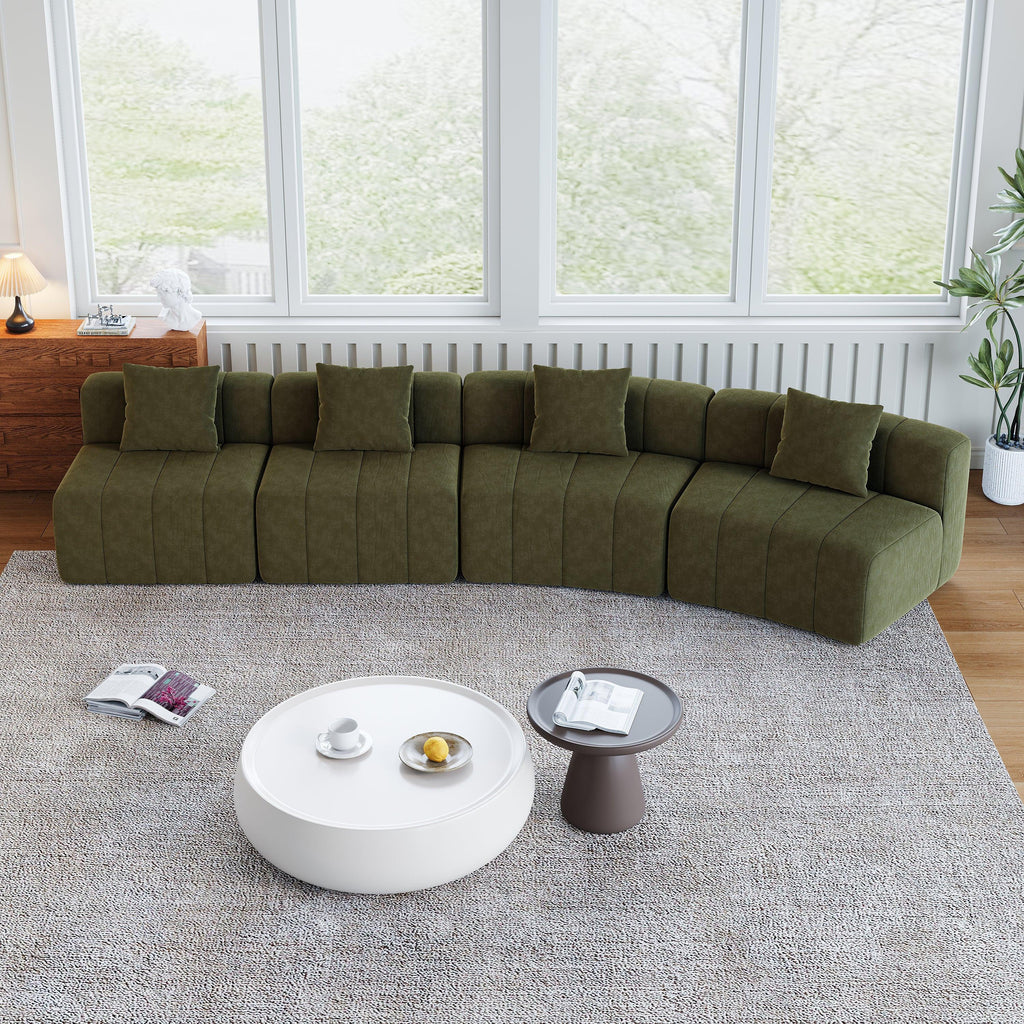 Curved Sectional Sofa with 4 Pillows for Comfortable Seating.