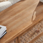 Smooth wooden top surface of the Rattan TV Stand Mid Century with Storage, perfect for decor or media accessories.