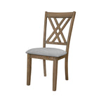 Three-quarter view of Amador Dining Chair showcasing its stylish cross back and gray upholstered seat.