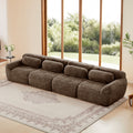 Modular chocolate plush sofa with 4 seats in a bright living room, featuring no-leg design and soft, non-slip base for versatile comfort.