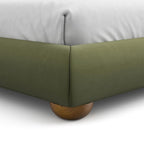 Olive Green Queen Size Bed with Boucle Upholstery.