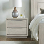 Modern two-drawer nightstand in gray oak wood with clean lines and sleek silver horizontal hardware.