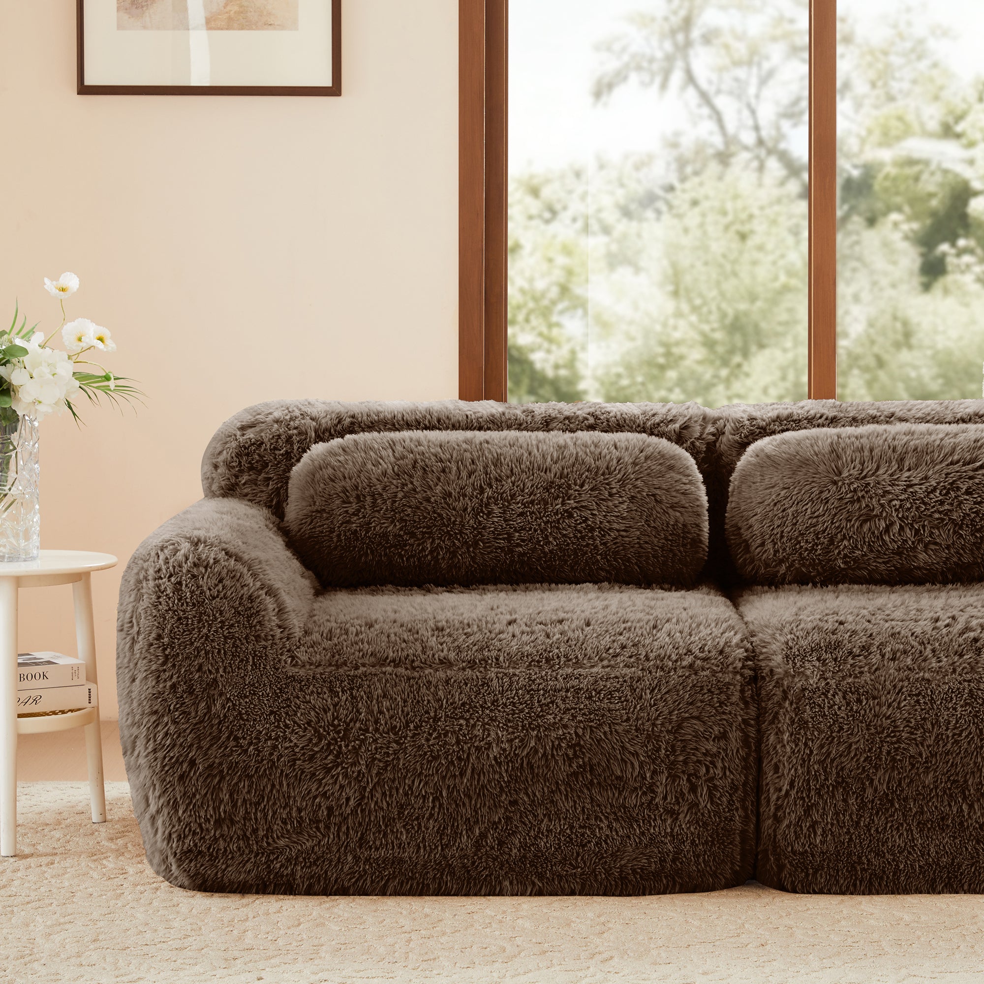 Close-up of chocolate modular sofa 3-seater plush fabric showing backrest and armrest in a serene home setting.