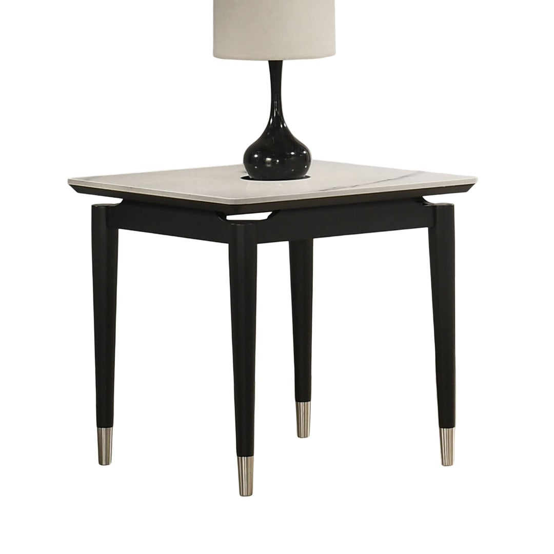 Sintered Stone End Table in contemporary design featuring sleek black arrow legs with silver tips and a white stone top.