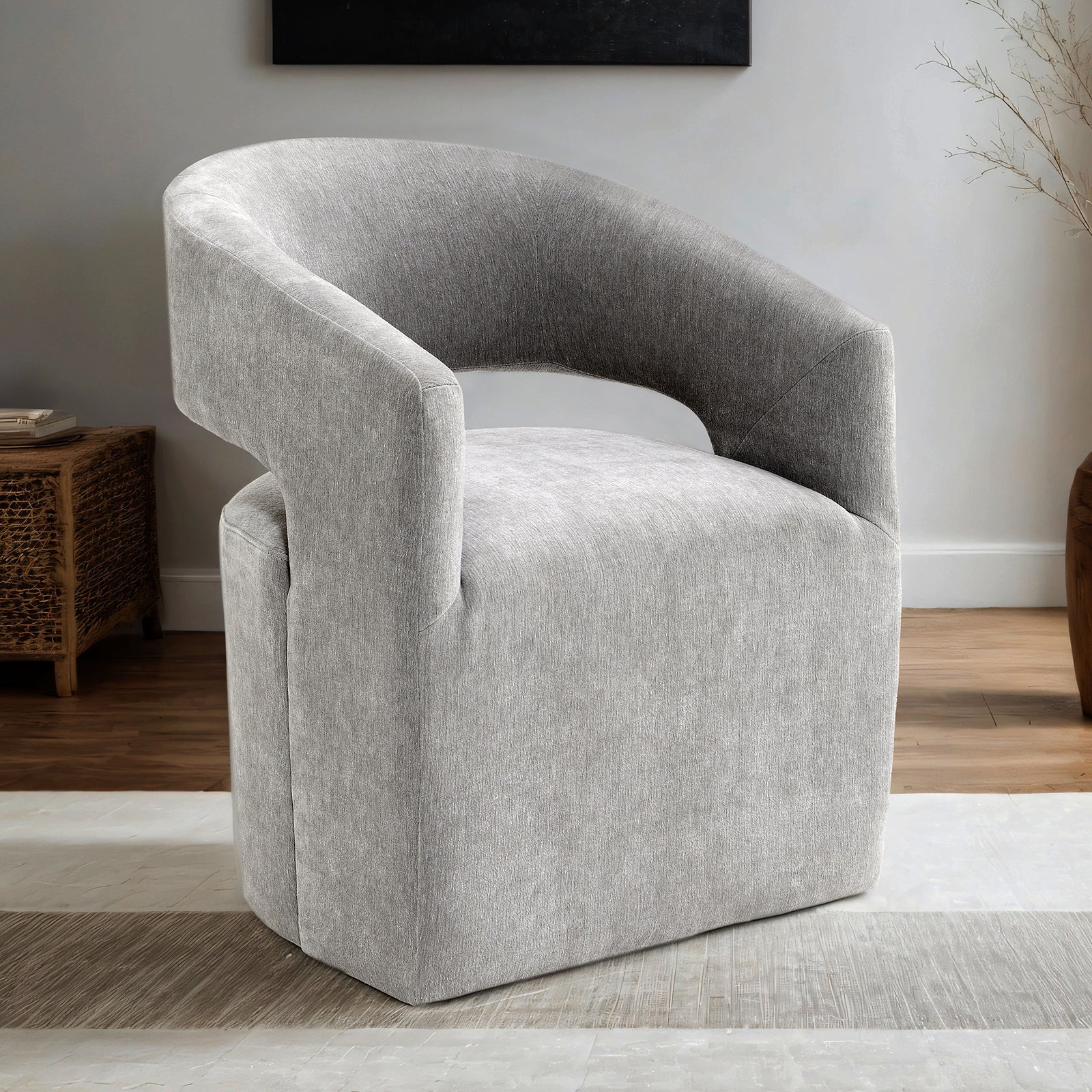 Contemporary Arm Chair - Casters Design featuring a curved back and pedestal base, ideal for stylish and functional seating.