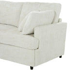 Close-up of armrest and cushion on U-shaped sectional sofa, showcasing textured chenille fabric and supportive padding.