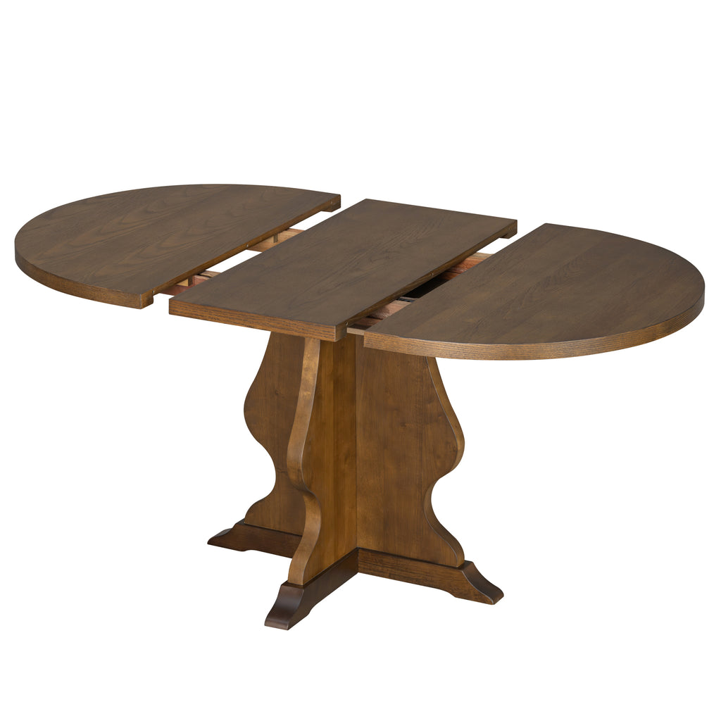 Farmhouse dining table partially extended with center leaf visible. Offers flexible seating for gatherings.