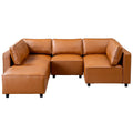 Cognac vegan leather sectional sofa with a modern modular design, foam-filled seat cushions, and sleek black legs.