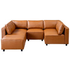 Cognac vegan leather sectional sofa with a modern modular design, foam-filled seat cushions, and sleek black legs.