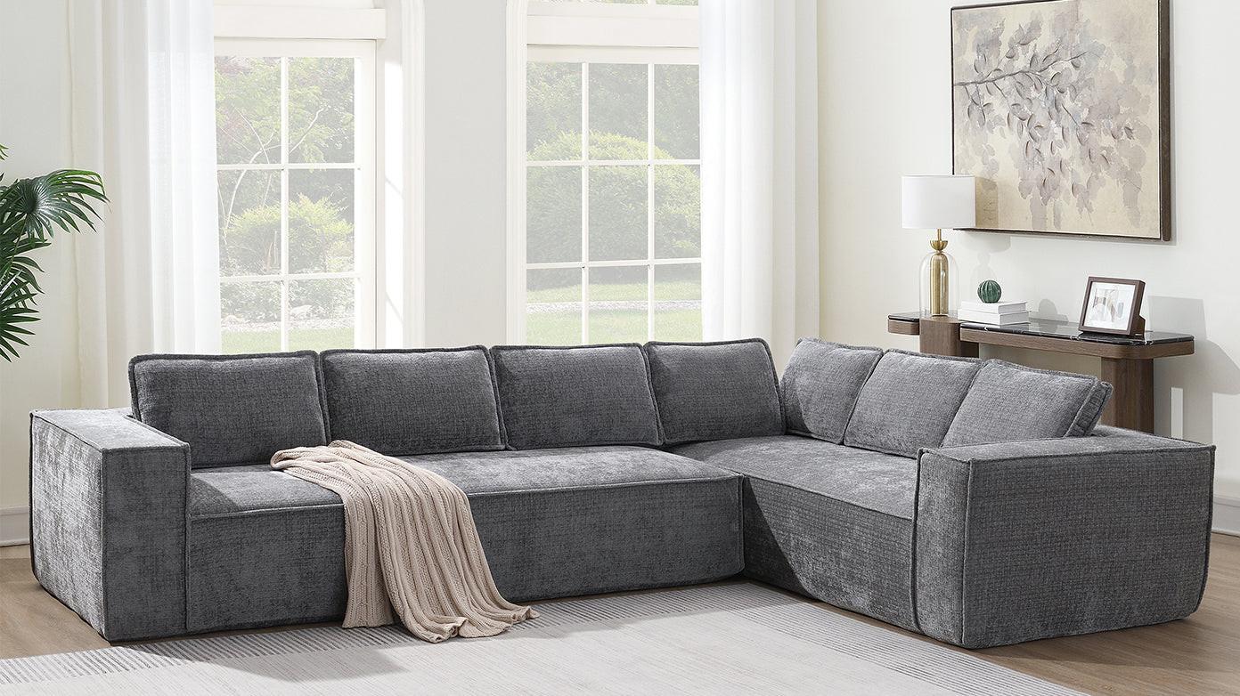 Chenille 6-Seater L-Shaped Modular Sectional Sofa in a sunlit room with decor, highlighting its spacious and elegant design.