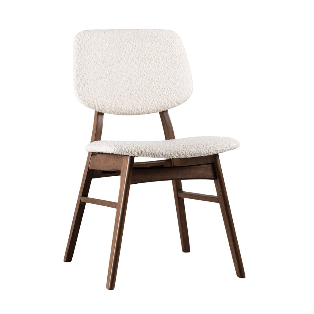 Stylish mid-century dining chair featuring angled wooden legs and a cushioned beige seat, perfect for elegant dining spaces.