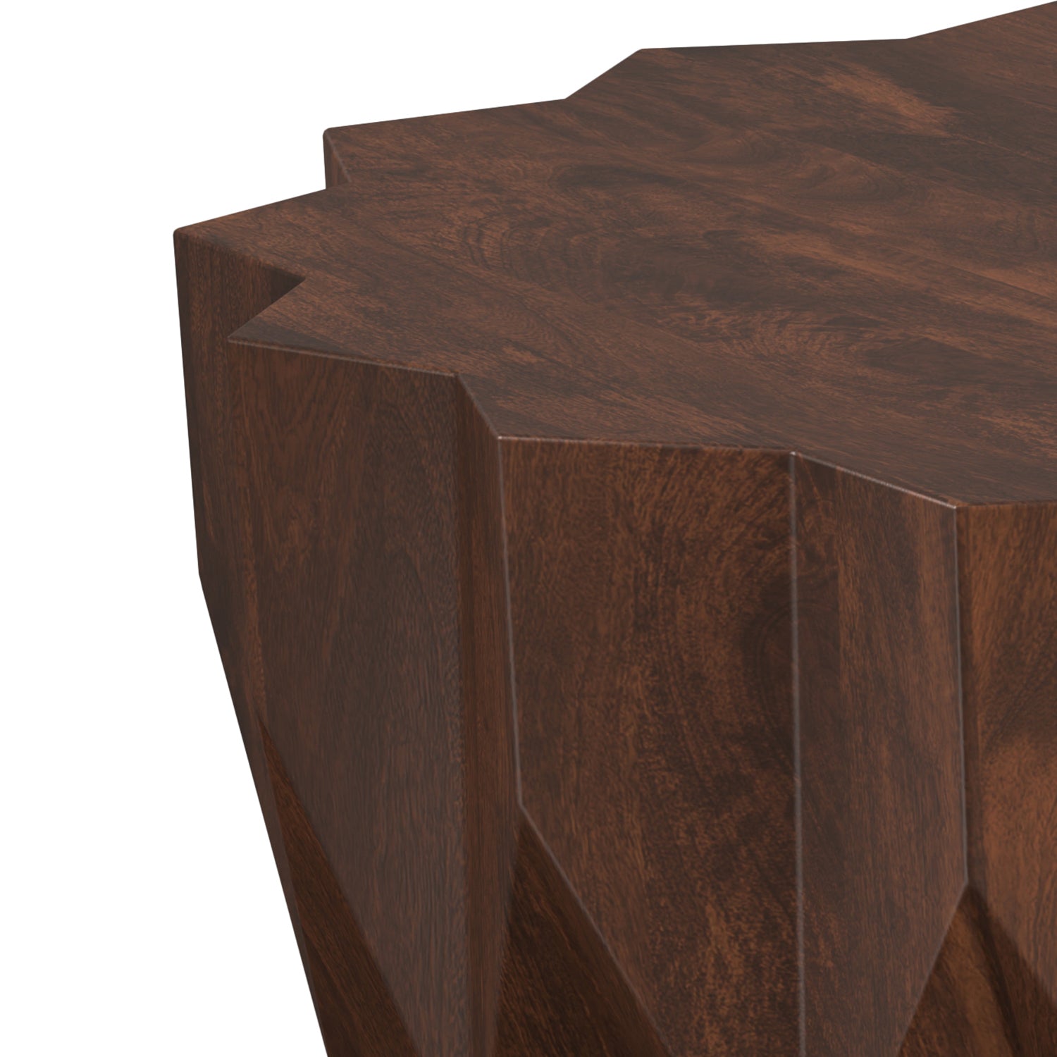 Close-up of Turnbull Walnut Coffee Table corner highlighting the faceted geometric carving and smooth wood grain.