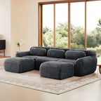 Dark grey modular sofa with chaise in boneless design, shown in a cozy home setting. Plush fabric and anti-slip base ideal for lounging.
