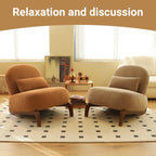 Pair of accent chairs with solid wood legs in a cozy living room setup, ideal for relaxation and conversation.