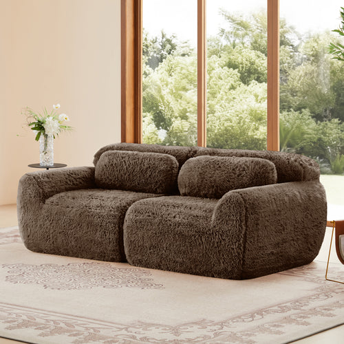 Modular 2-seater sofa in soft plush fabric with lumbar cushions, ideal for cozy and stylish living room setups.