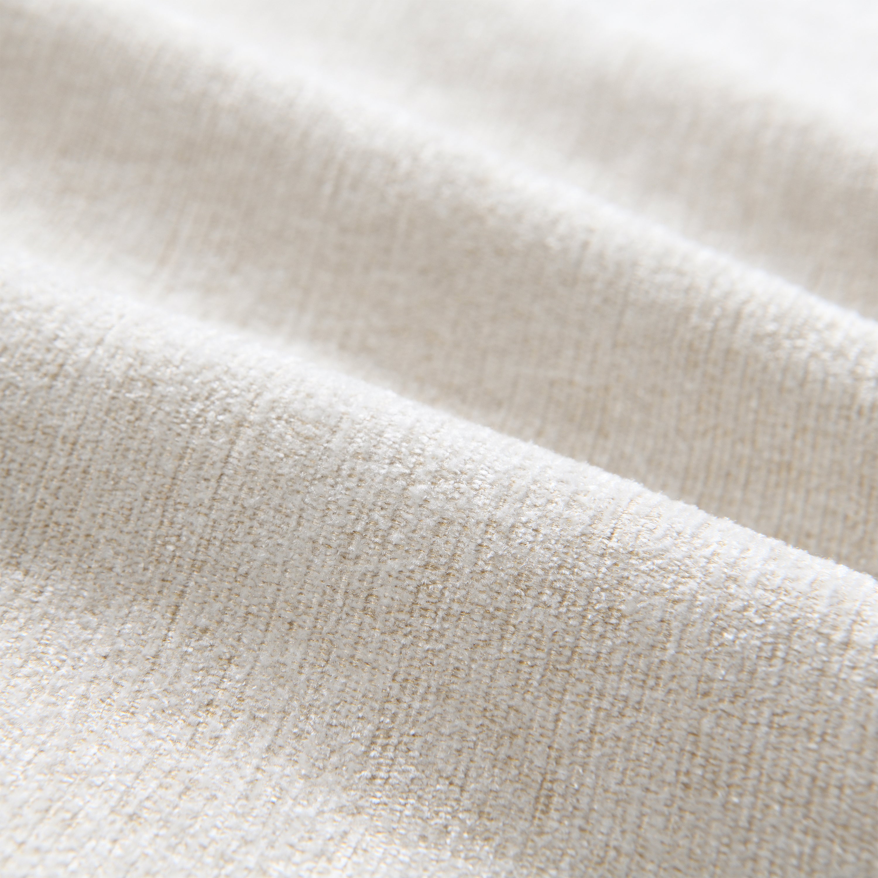 Close-up texture of soft chenille fabric used in the modular sectional sofa for a cozy and elegant finish.