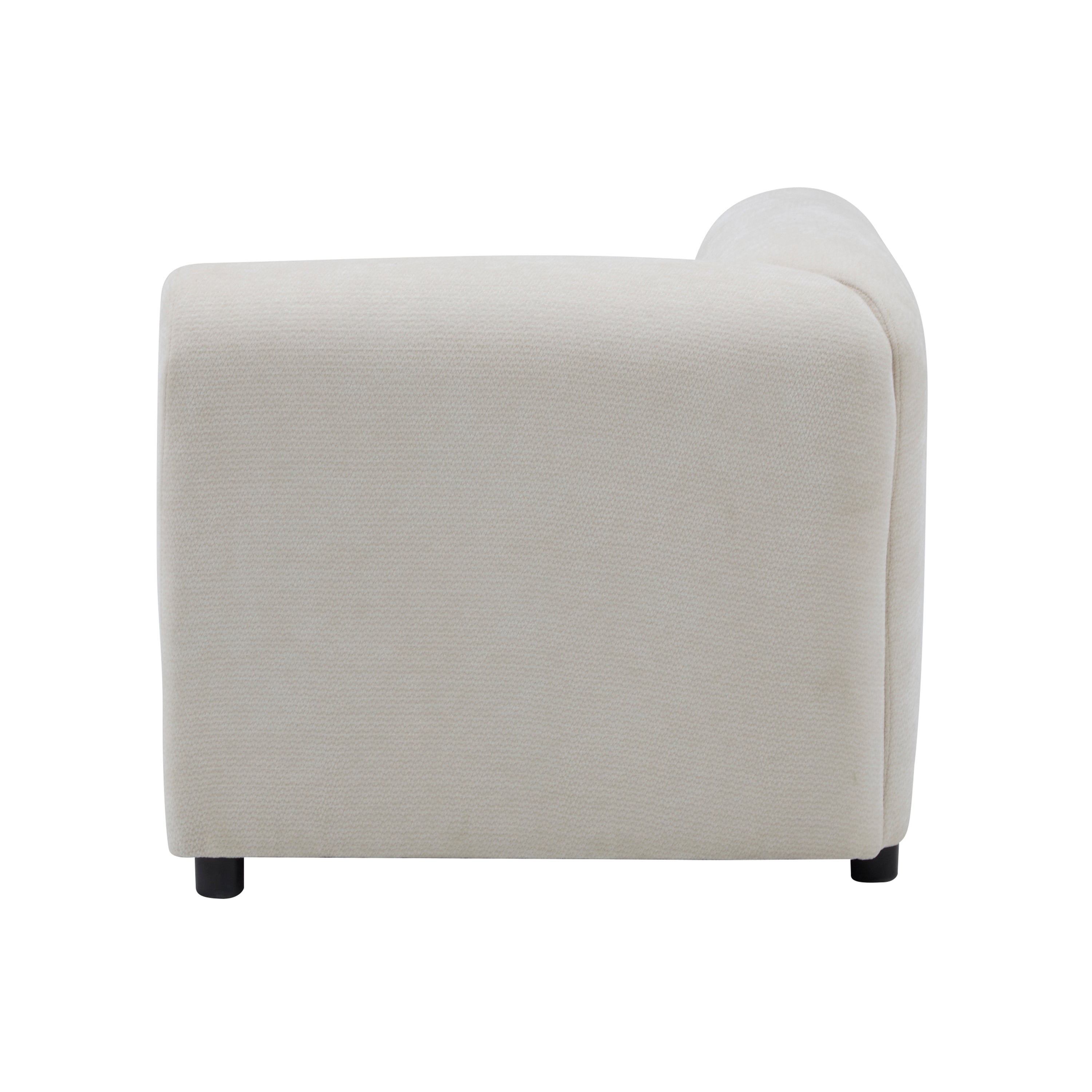 Side profile of the Evelyn modular sofa unit, showcasing its minimalist design and textured chenille upholstery.