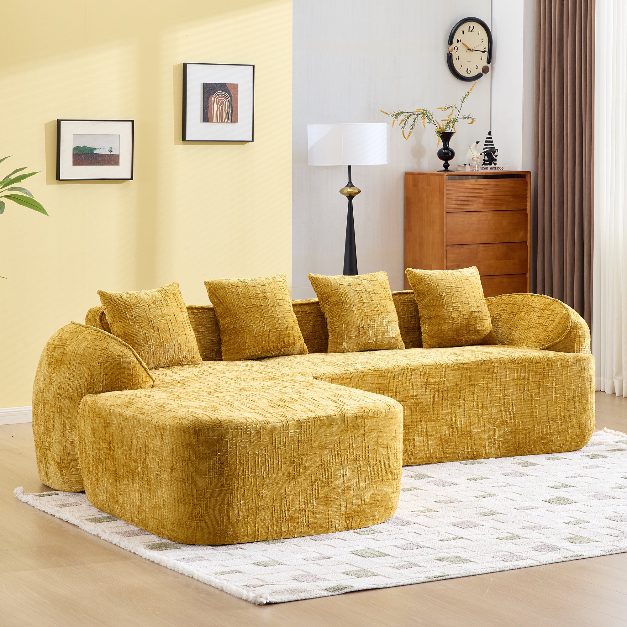 Modern yellow chenille L-shaped sofa with sponge and spring support, styled in a bright living room with wooden accents and artwork.