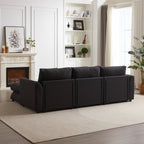 Rear view of modular L-shaped sofa with ottoman, highlighting the back panel design and sturdy construction.