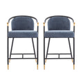 Upholstered Counter Stools Set of 2 with metal frames and blue fabric seats, featuring gold accents and a modern curved backrest design.