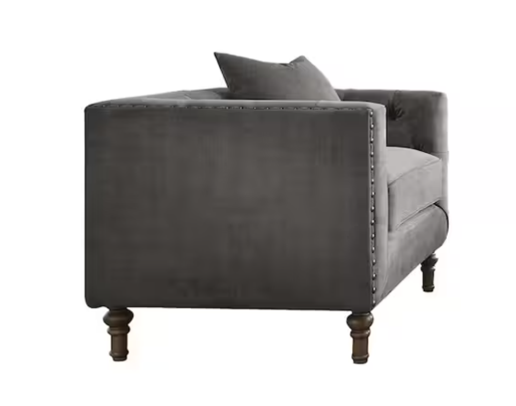 Sidonia Gray Velvet Chair with Pillow in angled view highlighting plush velvet upholstery and classic nailhead detailing for elegant comfort.