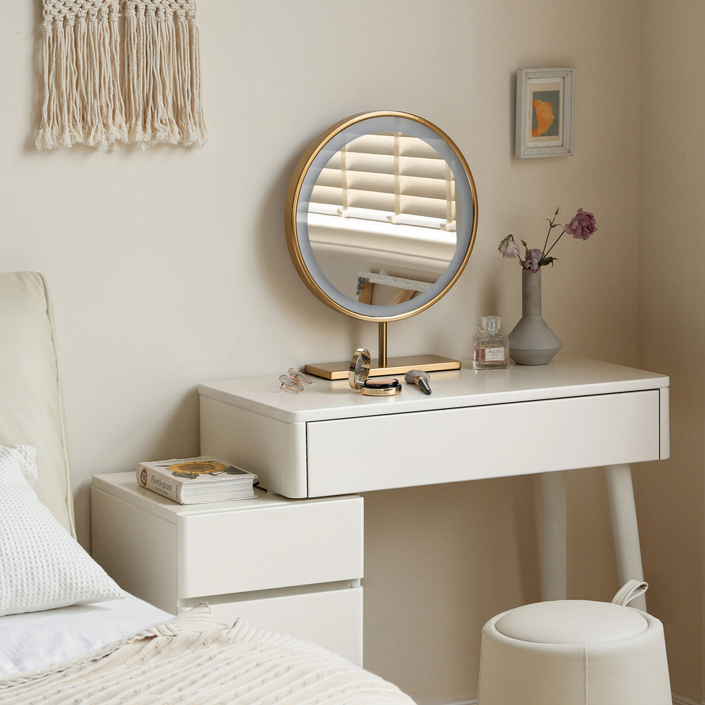White Solid Wood Dresser Table - Liriodendron Design with gold-rimmed mirror and decor, enhancing its elegance in a cozy bedroom corner.