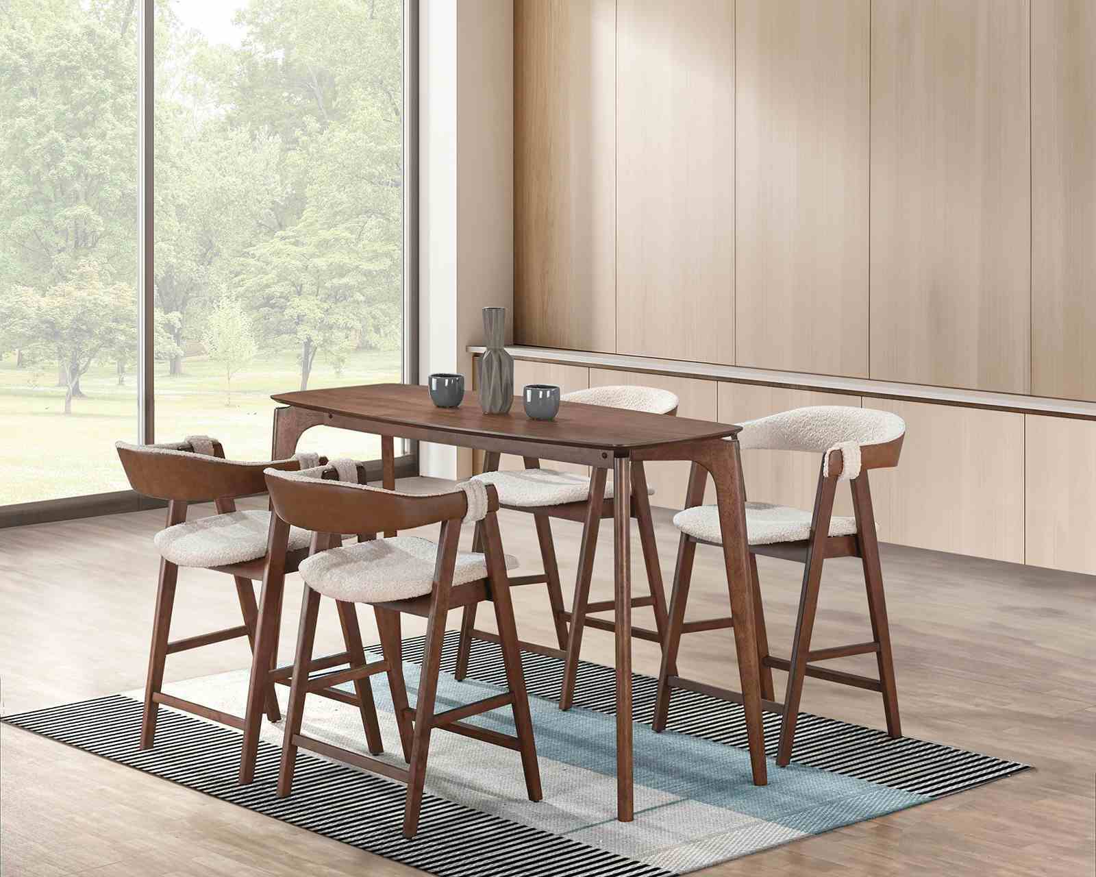 Dining room setup with Modern Counter Stool - Mid-Century Style | Walnut Beige, showcasing a complete set around a wooden high-top table.