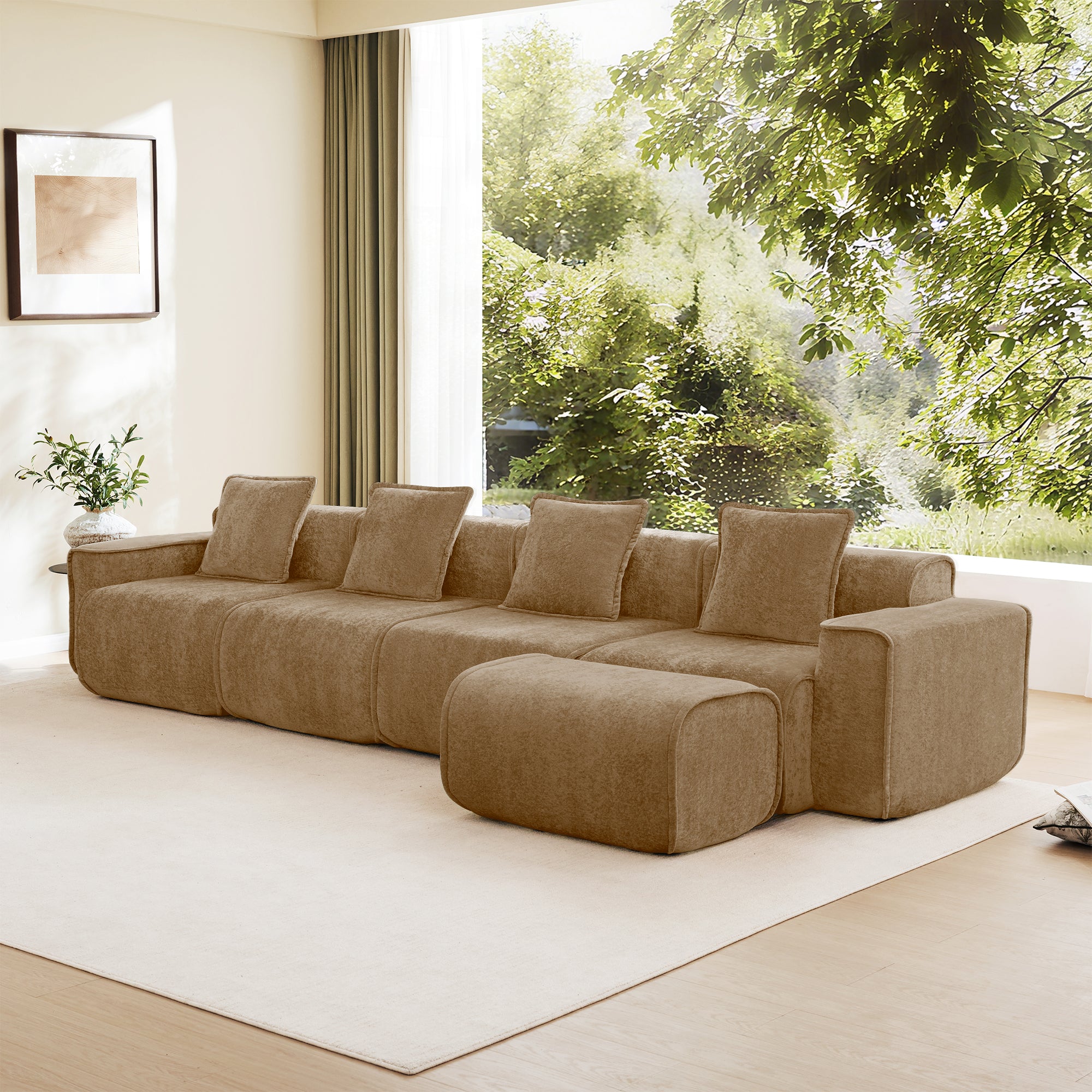 Spacious modular L shape sectional sofa in velvet brown, arranged in a bright living room with large windows and greenery outside.