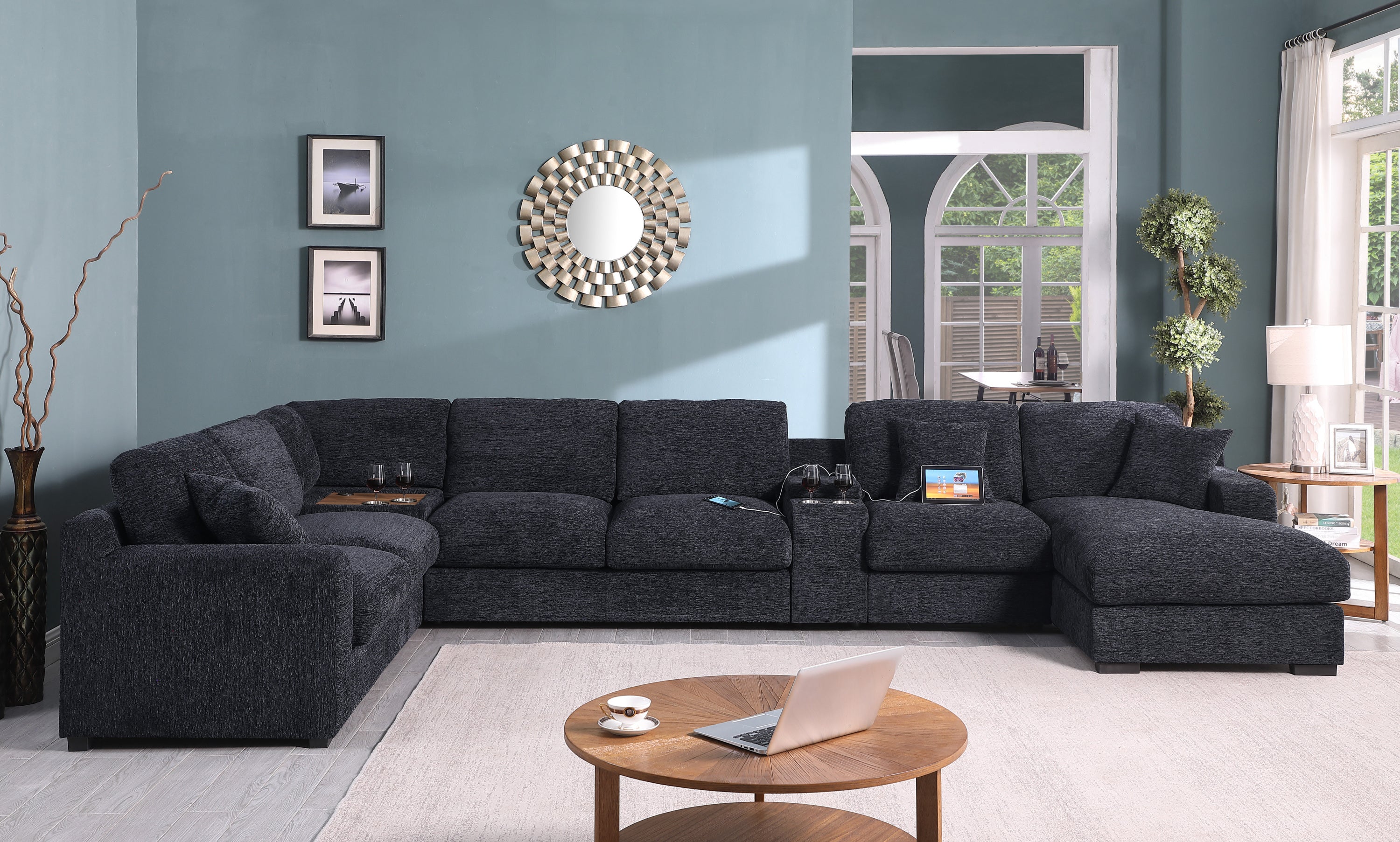 Full view of Celine sectional sofa in dark gray with chaise, cupholders, and USB ports. Ideal for contemporary living spaces.