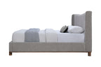 Side view of Melbourne Queen Bed in Gray Chenille. Upholstered queen bed frame with low-profile design and wooden legs.