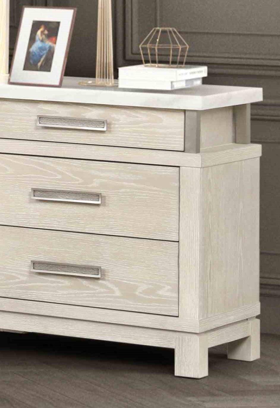Transitional Nightstand with Marble Top and Metal Handles.