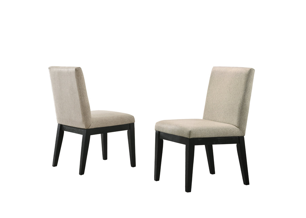 Pair of upholstered chairs from Jasper Dining Set - Black Round Table & Chairs. Beige fabric with black wooden legs.