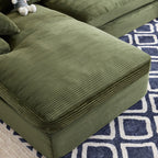 Green Corduroy Sofa with Cushions and Pillows.