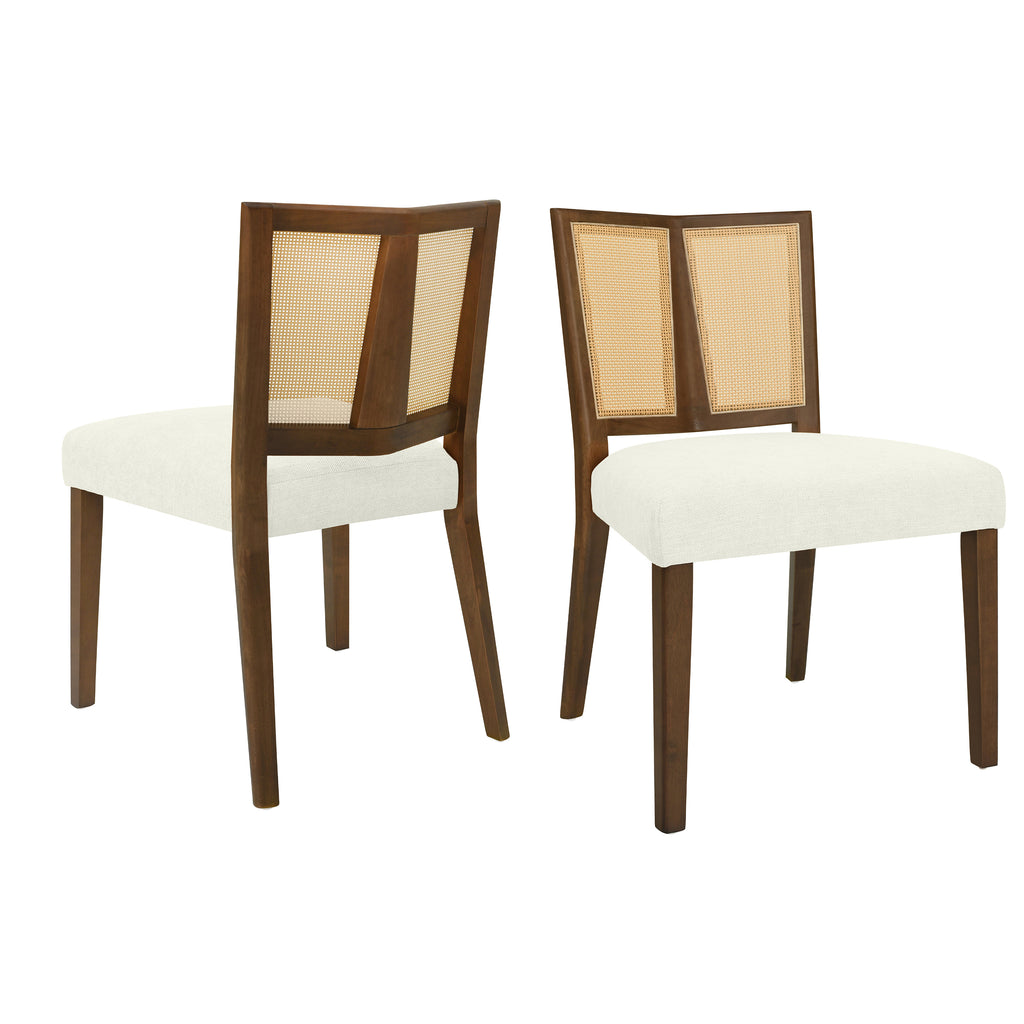 Set of 2 mid-century dining chairs with rattan backs and cushioned seats in white fabric, featuring dark rubberwood frames.