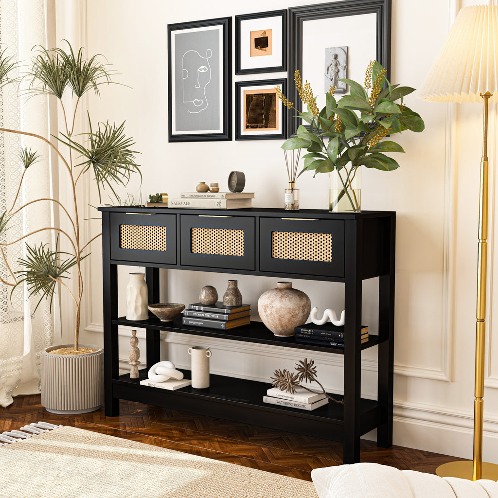 43.3' farmhouse console table in black with rattan drawers, styled with earthy decor and books in a bright, elegant room.