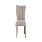 Modern Beige Dining Chair with tufted backrest and rubberwood legs, ideal for contemporary dining room settings.