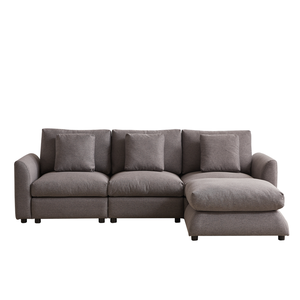 Full-length modular sofa with ottoman extension, upholstered in gray fabric, ideal for modern living rooms or apartments seeking comfort and style.