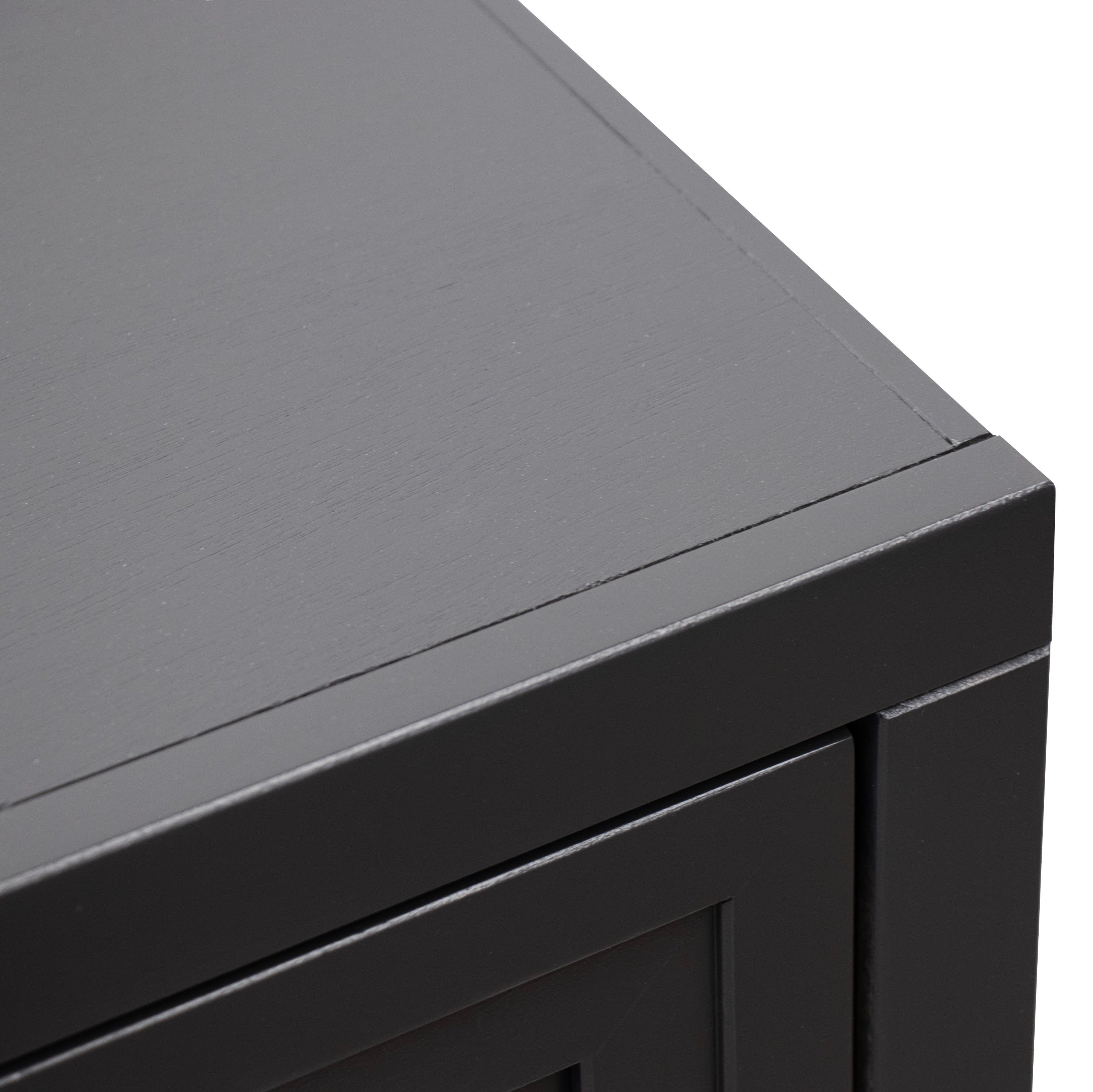 Close-up of Nora 22 Inch End Table's black wood grain texture, emphasizing quality craftsmanship and modern finish.