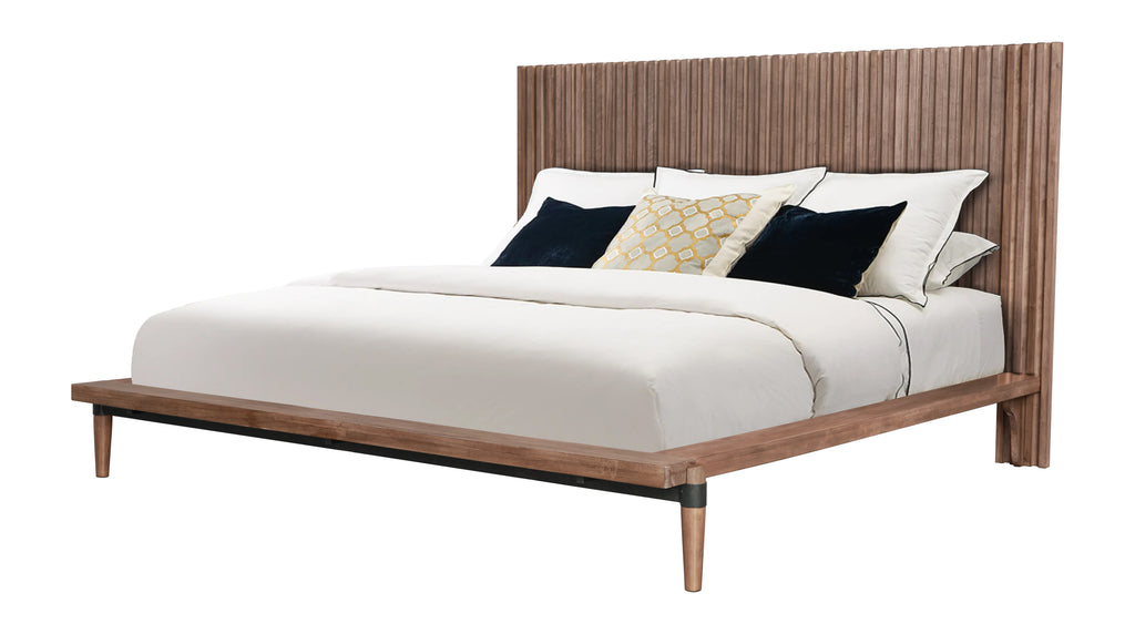 Angled view of Queen Size Platform Bed with walnut wood frame and tall slatted headboard, showcasing minimal assembly design.