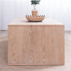 Side profile of the Rustic Beaded Edge Coffee Table displaying vertical wood grain pattern and clean rectangular lines.
