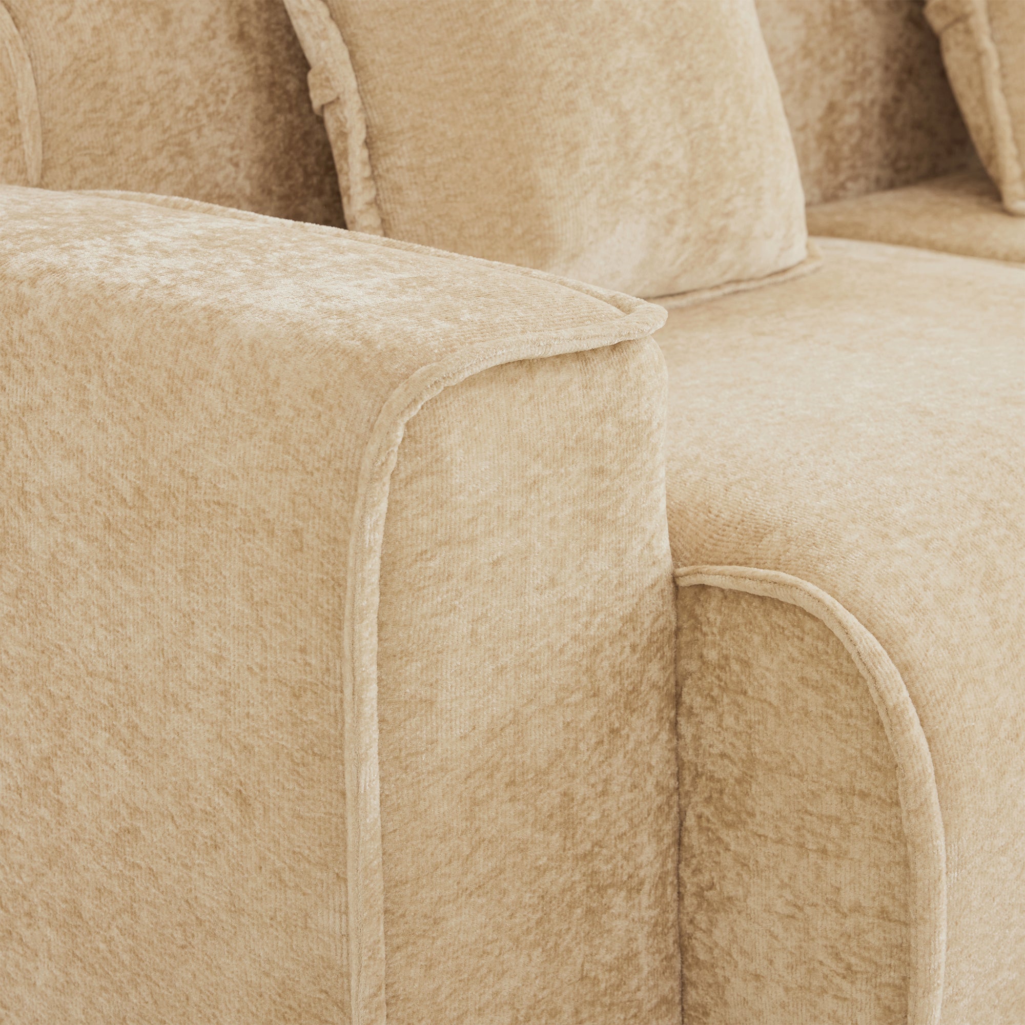 Detailed view of armrest stitching and velvet texture on 3-seat Modular Velvet Sectional Sofa. Durable and stylish for everyday use.