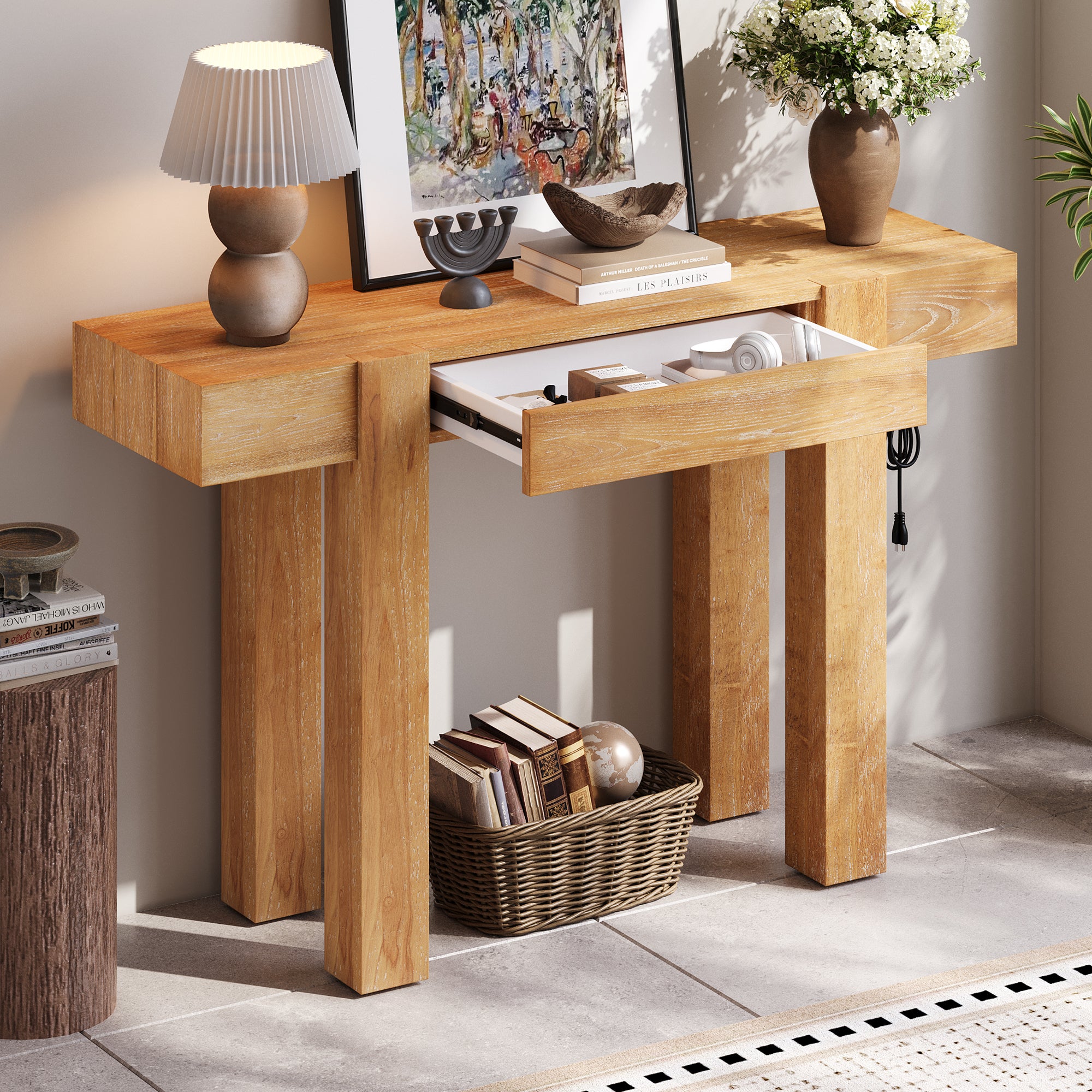 Rustic wood console table with outlet and hidden drawer, styled in entryway with decor and basket underneath. Solid natural finish enhances charm.