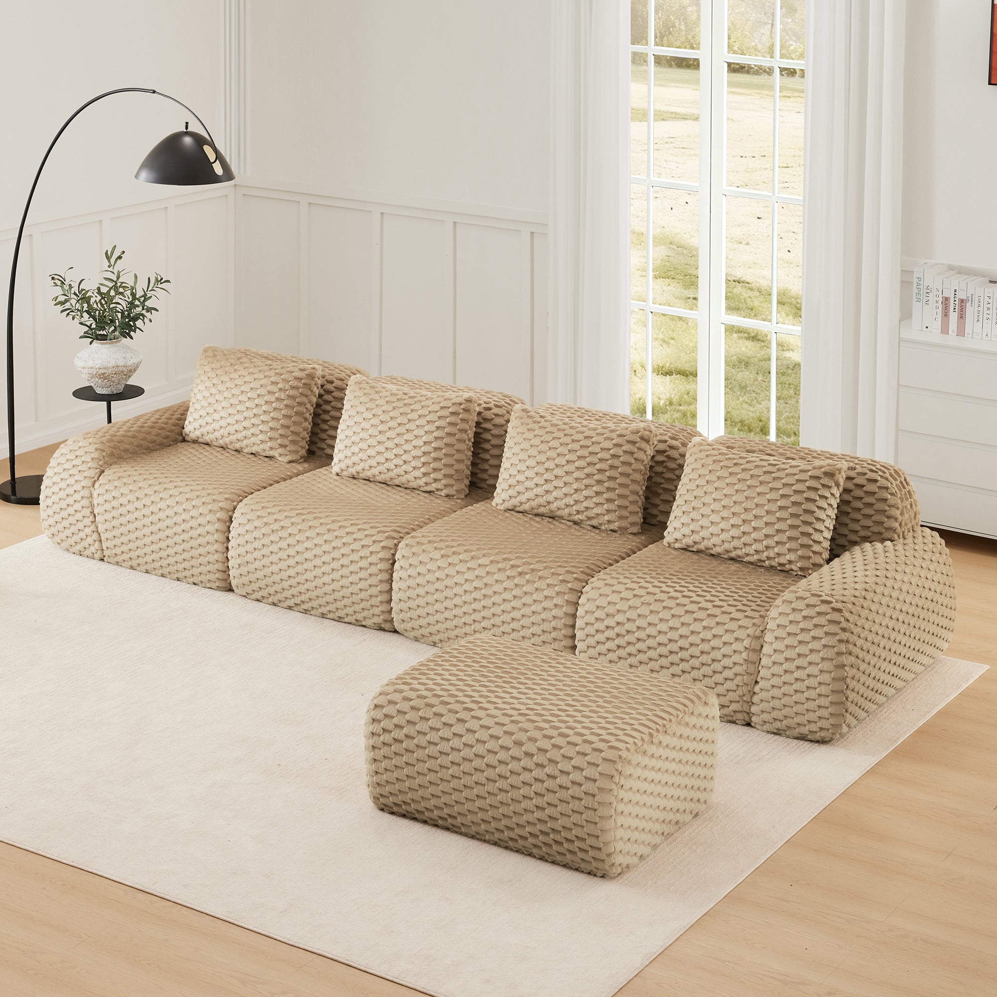L-Shaped Modular Sectional Sofa with flannelette fabric and ottoman, designed for comfort and flexibility in modern living room spaces.