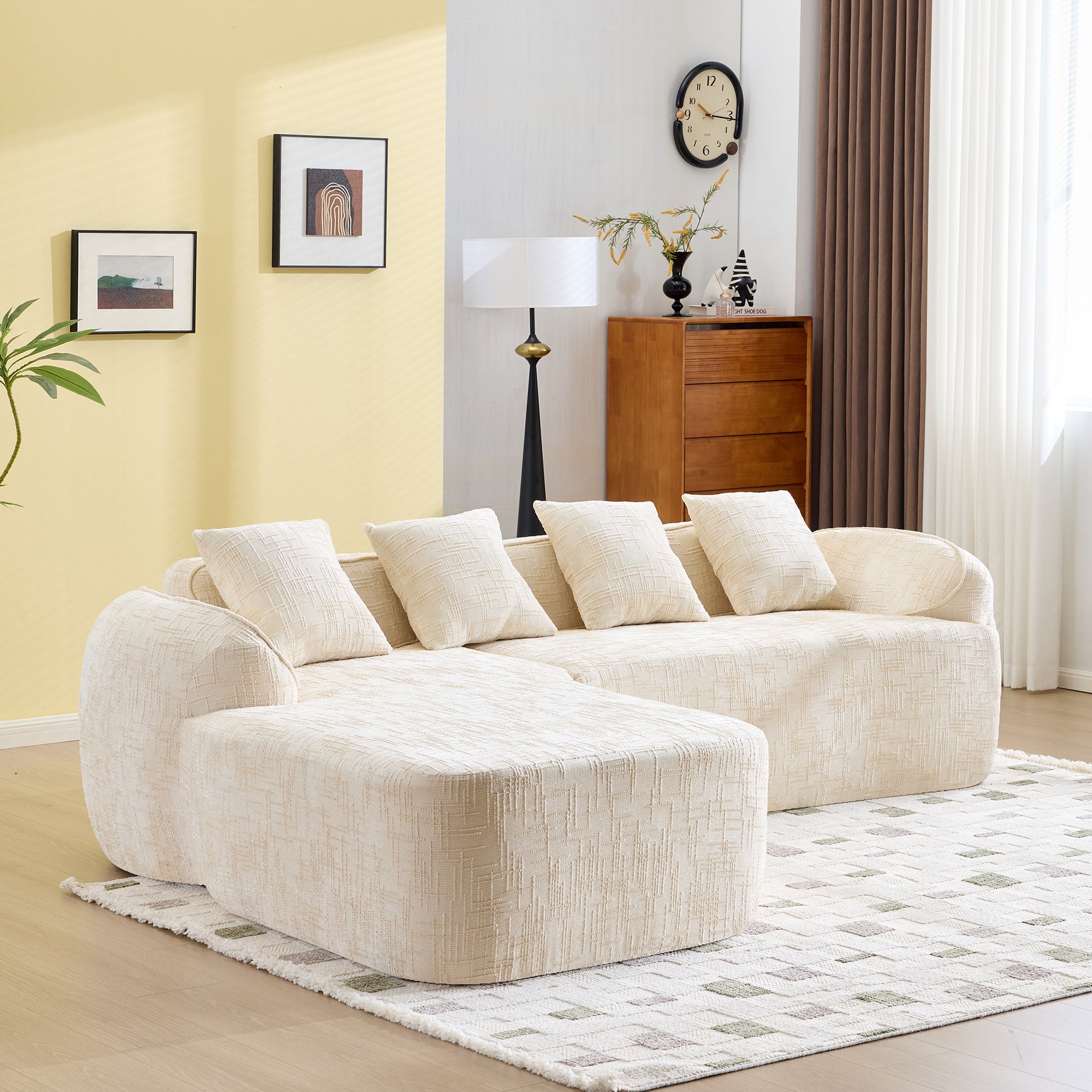 Modern L-shaped beige chenille sofa with soft texture and ample seating, designed for comfort and aesthetic appeal.