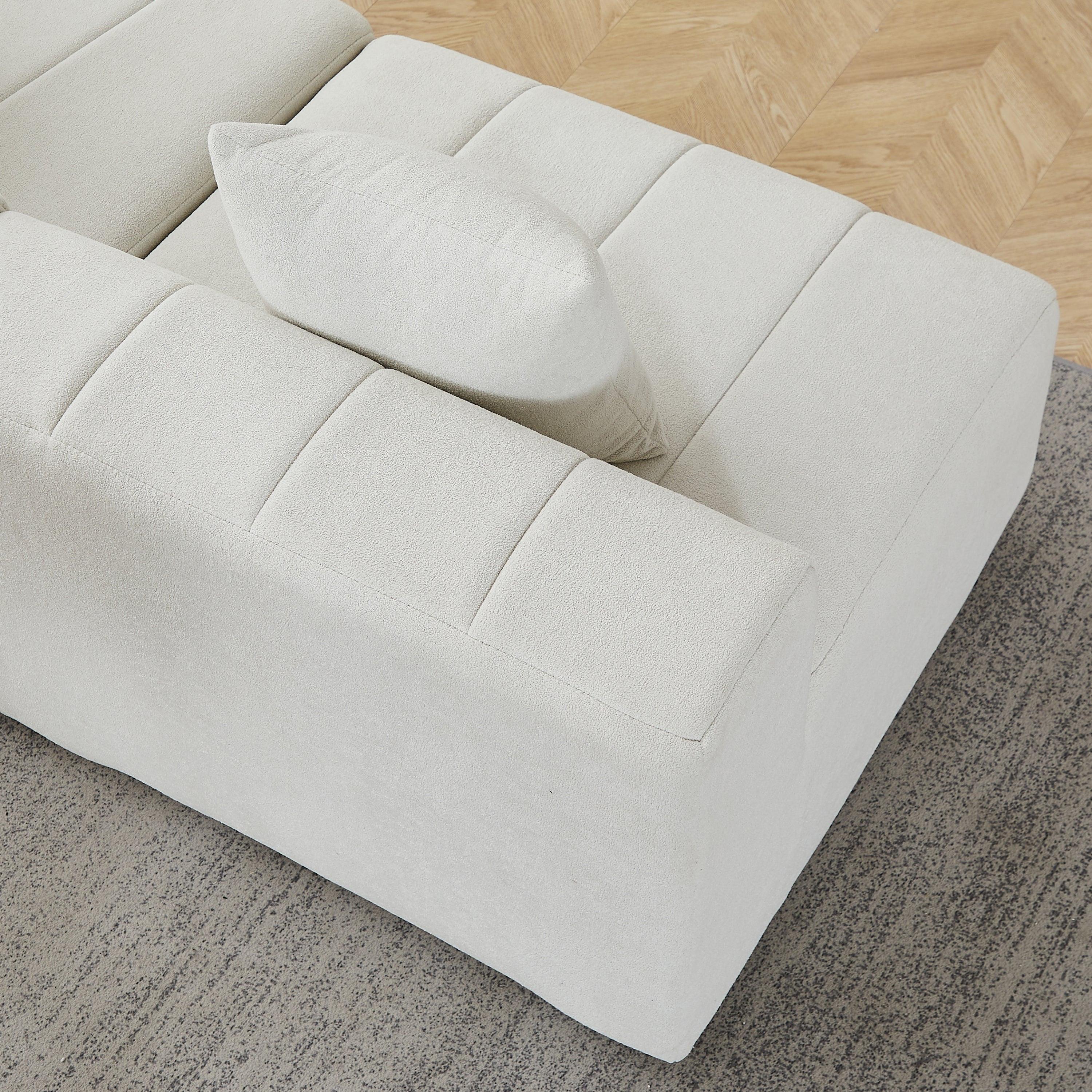 Curved Sectional Sofa with 4 Pillows for Stylish Seating.