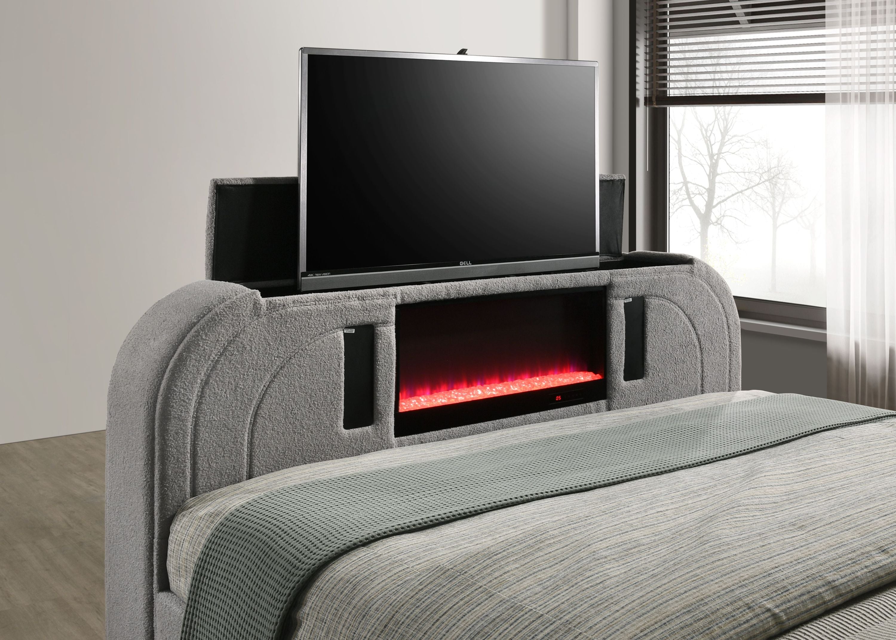 Close-up of Gray Sherpa Bed footboard with pop-up TV, red LED lighting, and Bluetooth speaker system for immersive entertainment.