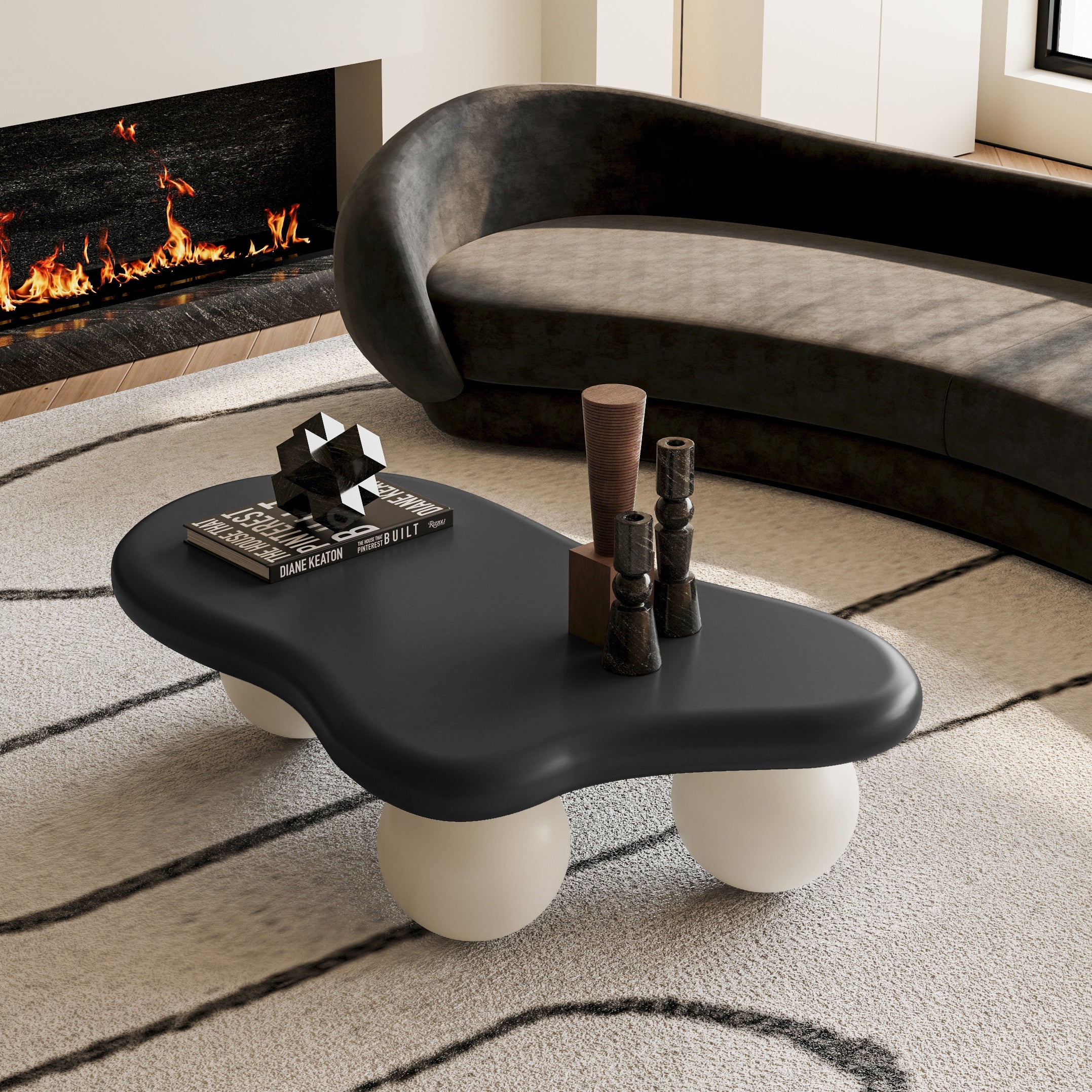 Contemporary Cloud Shaped Coffee Table with black surface and white legs placed in a luxury living room with fireplace. Perfect for upscale interiors.